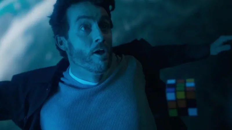 Man reacting inside a blue-lit Opel Frontera