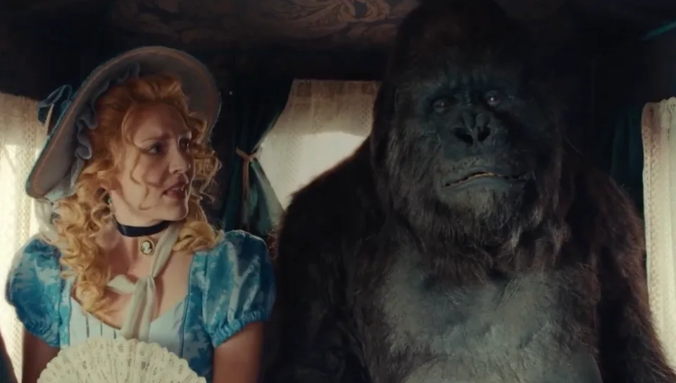 A woman in period costume sits beside a gorilla in Imanol Ruiz de Lara’s Sitges campaign